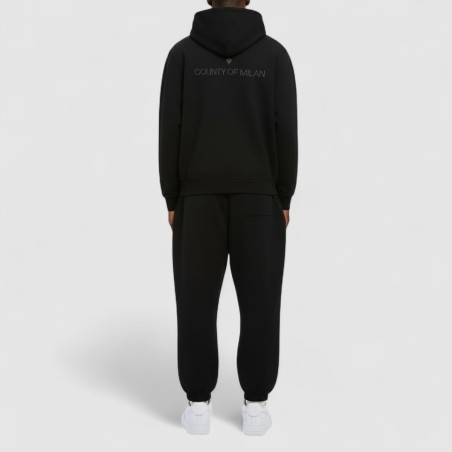 COUNTY OF MILAN - Pantalones efecto lavado con logotipo