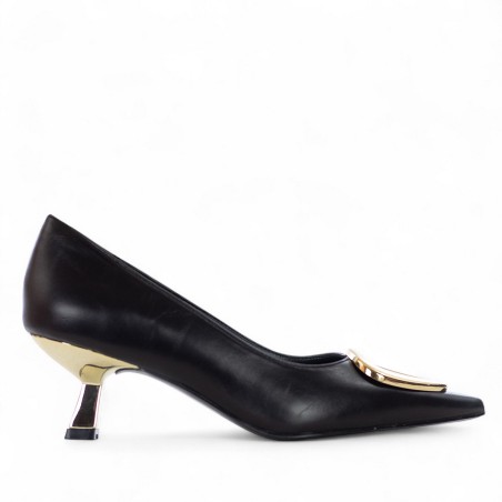 EXÉ - Pump with ornamental accessory